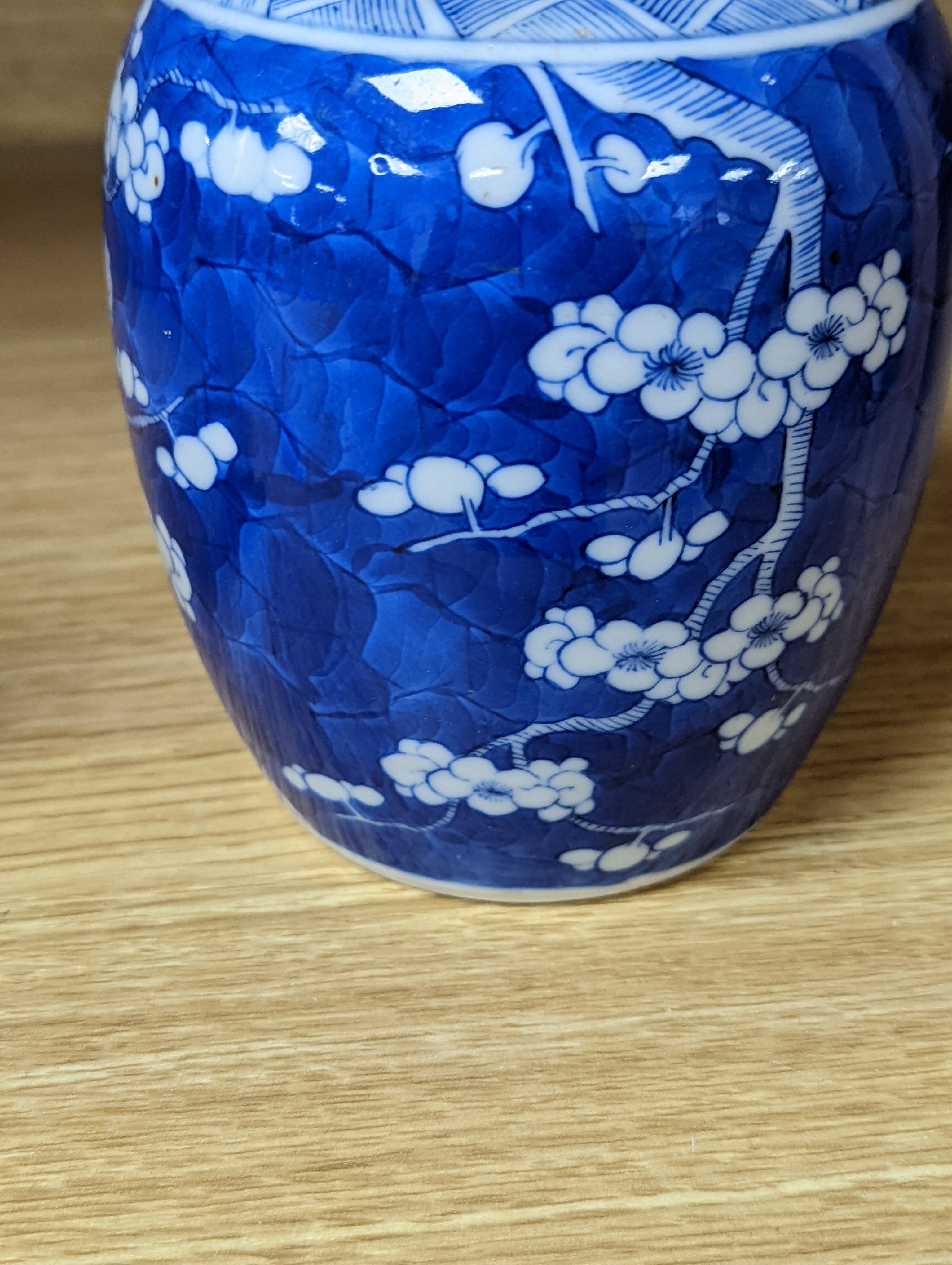 A 19th century Chinese blue and white prunus jar 13.5cm